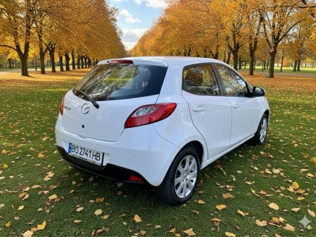 Білий Мазда 2, об'ємом двигуна 1.5 л та пробігом 139 тис. км за 5900 $, фото 4 на Automoto.ua