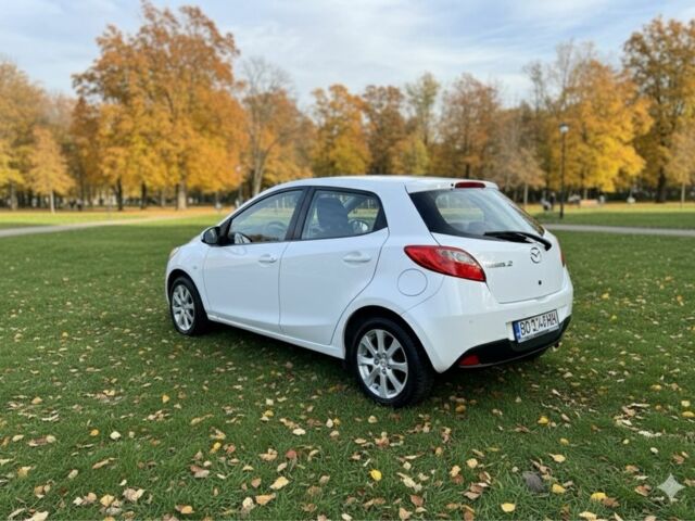 Білий Мазда 2, об'ємом двигуна 1.5 л та пробігом 139 тис. км за 5900 $, фото 2 на Automoto.ua