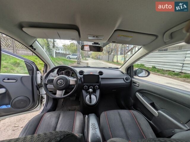 Білий Мазда 2, об'ємом двигуна 1.5 л та пробігом 194 тис. км за 8700 $, фото 15 на Automoto.ua