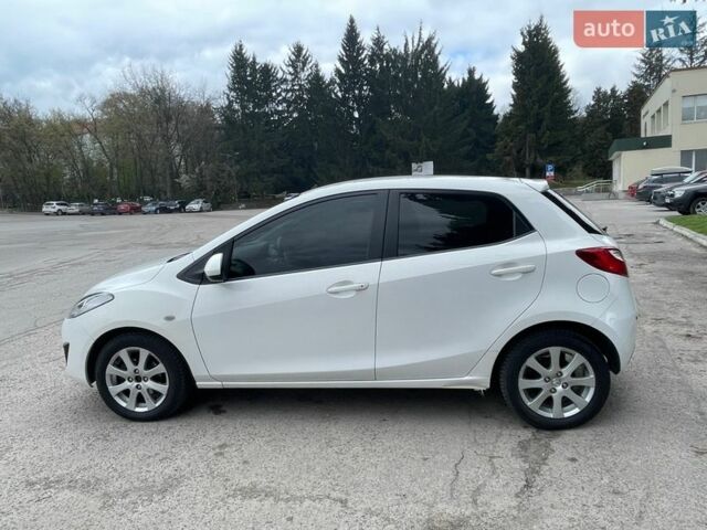 Белый Мазда 2, объемом двигателя 1.5 л и пробегом 74 тыс. км за 8150 $, фото 4 на Automoto.ua