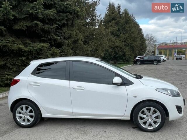 Белый Мазда 2, объемом двигателя 1.5 л и пробегом 74 тыс. км за 8150 $, фото 5 на Automoto.ua