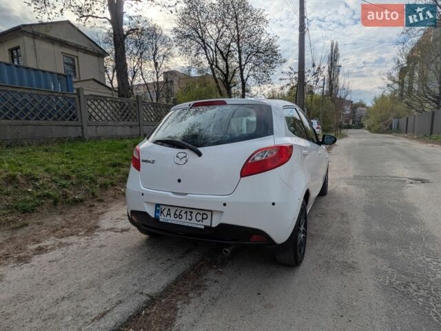 Білий Мазда 2, об'ємом двигуна 1.5 л та пробігом 194 тис. км за 8700 $, фото 7 на Automoto.ua
