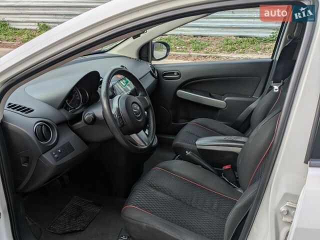 Белый Мазда 2, объемом двигателя 1.5 л и пробегом 194 тыс. км за 8700 $, фото 12 на Automoto.ua