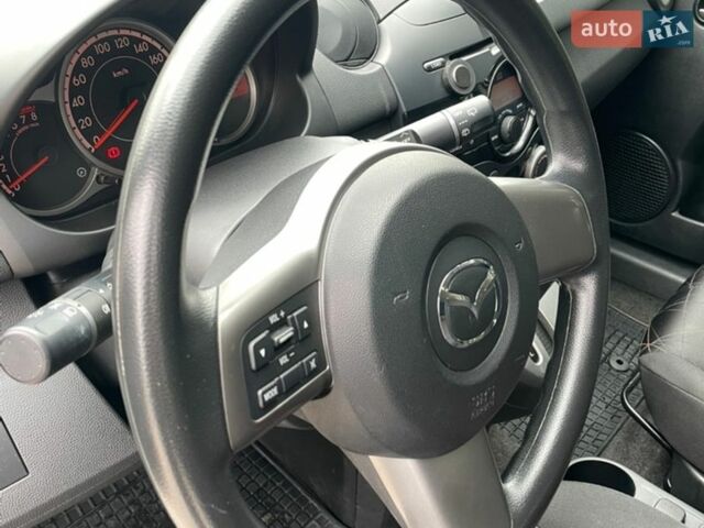 Белый Мазда 2, объемом двигателя 1.5 л и пробегом 74 тыс. км за 8150 $, фото 11 на Automoto.ua