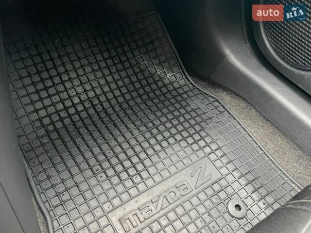 Белый Мазда 2, объемом двигателя 1.5 л и пробегом 74 тыс. км за 8150 $, фото 17 на Automoto.ua