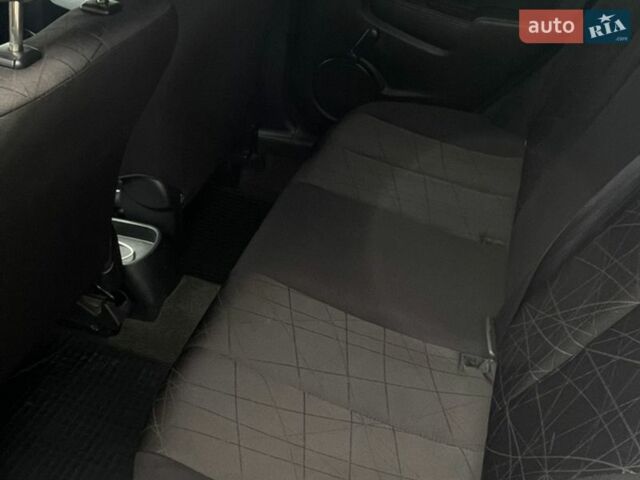 Белый Мазда 2, объемом двигателя 1.5 л и пробегом 74 тыс. км за 8150 $, фото 10 на Automoto.ua