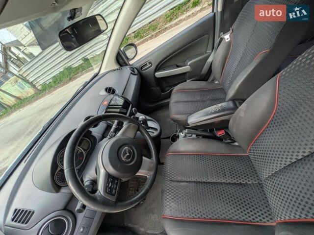 Белый Мазда 2, объемом двигателя 1.5 л и пробегом 194 тыс. км за 8700 $, фото 13 на Automoto.ua