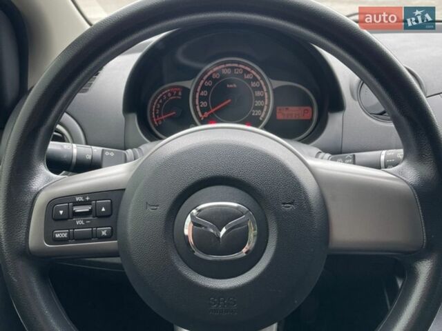 Белый Мазда 2, объемом двигателя 1.5 л и пробегом 74 тыс. км за 8150 $, фото 18 на Automoto.ua