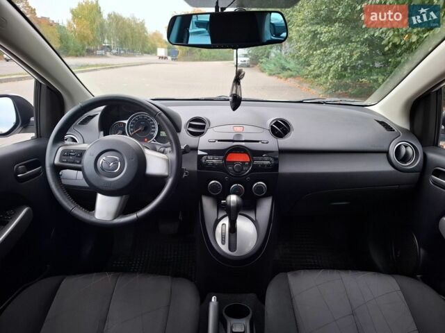 Білий Мазда 2, об'ємом двигуна 1.5 л та пробігом 151 тис. км за 8700 $, фото 29 на Automoto.ua