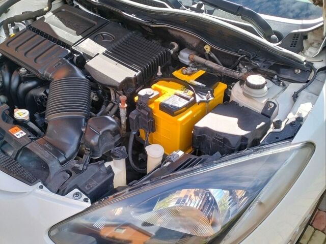 Білий Мазда 2, об'ємом двигуна 1.5 л та пробігом 151 тис. км за 7800 $, фото 11 на Automoto.ua