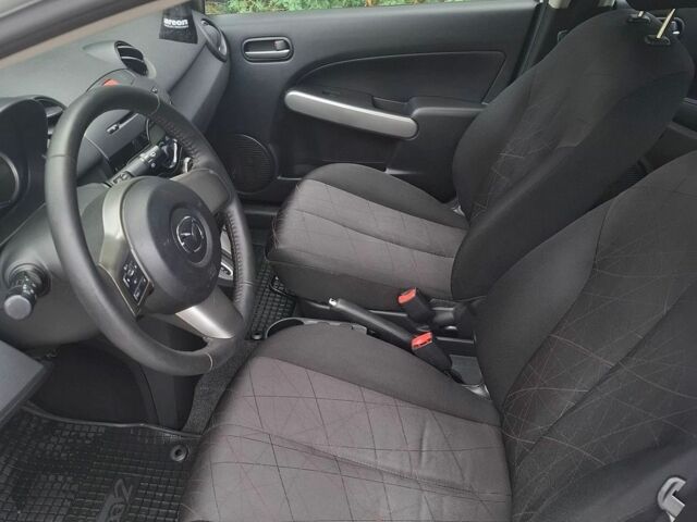 Білий Мазда 2, об'ємом двигуна 1.5 л та пробігом 151 тис. км за 8700 $, фото 15 на Automoto.ua