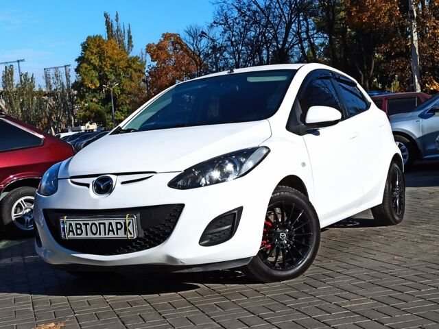 Білий Мазда 2, об'ємом двигуна 1.5 л та пробігом 106 тис. км за 8499 $, фото 3 на Automoto.ua