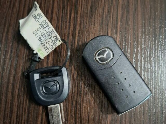 Білий Мазда 2, об'ємом двигуна 1.5 л та пробігом 151 тис. км за 8700 $, фото 37 на Automoto.ua