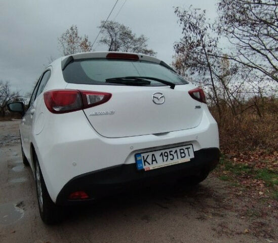 Білий Мазда 2, об'ємом двигуна 15 л та пробігом 131 тис. км за 10700 $, фото 17 на Automoto.ua