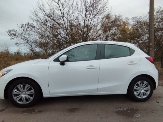 Білий Мазда 2, об'ємом двигуна 15 л та пробігом 131 тис. км за 10700 $, фото 6 на Automoto.ua