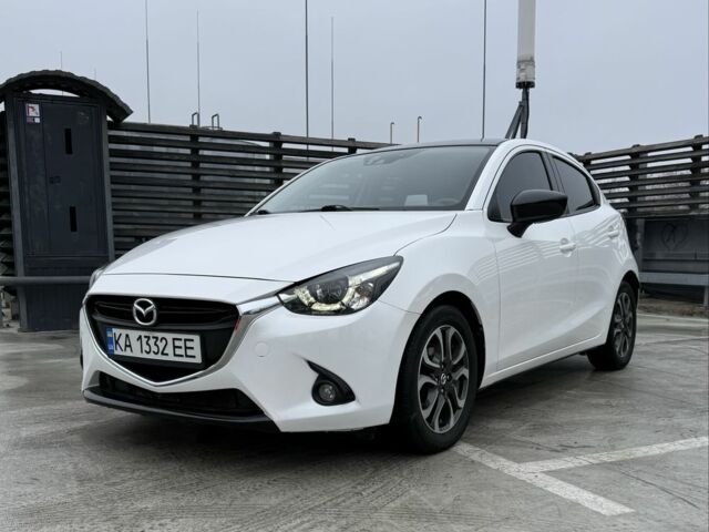 Белый Мазда 2, объемом двигателя 1.5 л и пробегом 75 тыс. км за 273 $, фото 1 на Automoto.ua