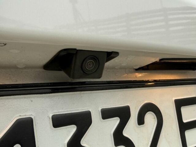 Белый Мазда 2, объемом двигателя 1.5 л и пробегом 75 тыс. км за 273 $, фото 7 на Automoto.ua