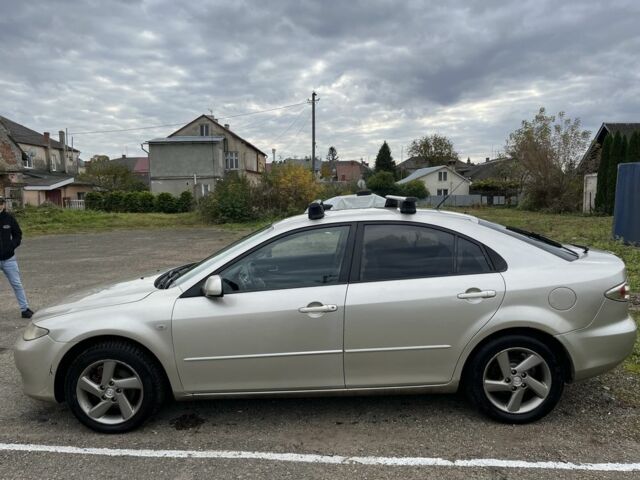 Бежевый Мазда 2, объемом двигателя 2 л и пробегом 310 тыс. км за 3200 $, фото 3 на Automoto.ua