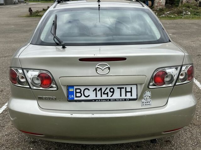 Бежевый Мазда 2, объемом двигателя 2 л и пробегом 310 тыс. км за 3200 $, фото 2 на Automoto.ua