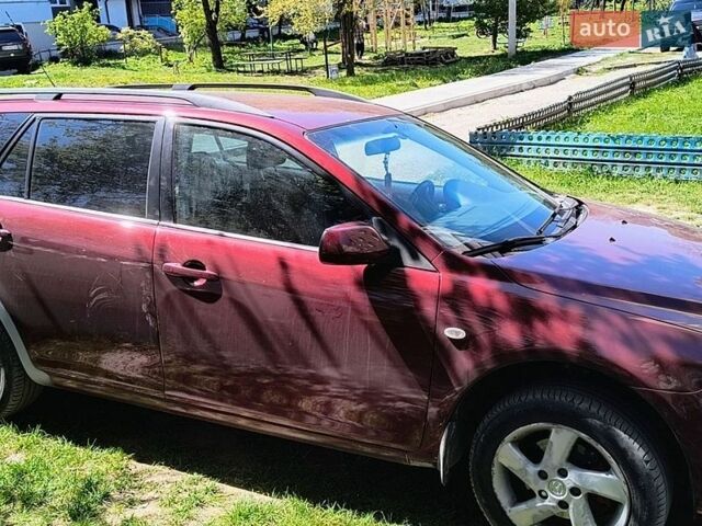 Черный Мазда 2, объемом двигателя 2 л и пробегом 315 тыс. км за 3600 $, фото 2 на Automoto.ua