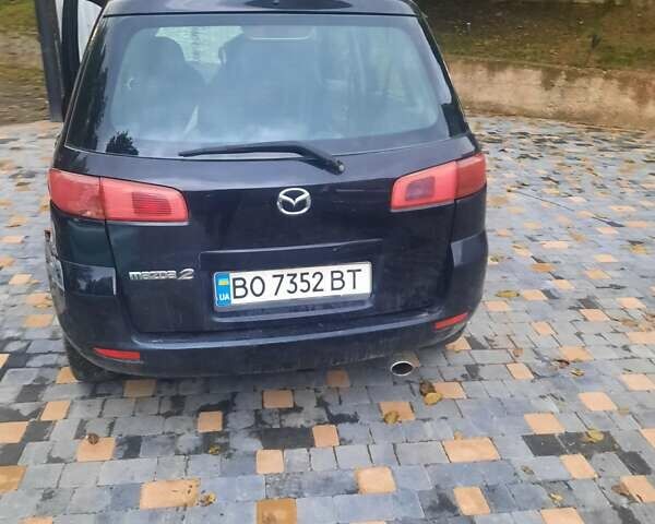 Черный Мазда 2, объемом двигателя 1.24 л и пробегом 200 тыс. км за 1200 $, фото 5 на Automoto.ua