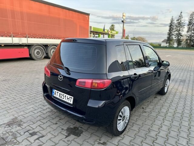 Чорний Мазда 2, об'ємом двигуна 1.2 л та пробігом 190 тис. км за 3450 $, фото 14 на Automoto.ua