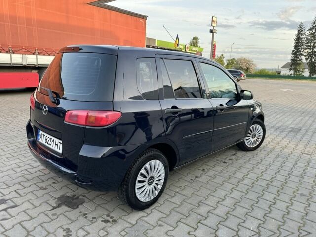Чорний Мазда 2, об'ємом двигуна 1.2 л та пробігом 190 тис. км за 3500 $, фото 3 на Automoto.ua