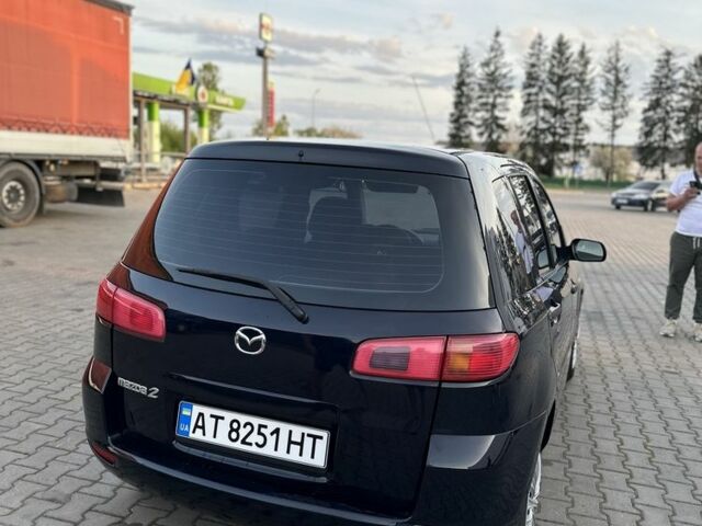 Чорний Мазда 2, об'ємом двигуна 1.2 л та пробігом 190 тис. км за 3500 $, фото 13 на Automoto.ua