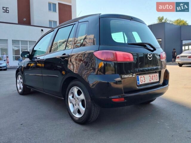 Чорний Мазда 2, об'ємом двигуна 1.4 л та пробігом 260 тис. км за 1700 $, фото 6 на Automoto.ua