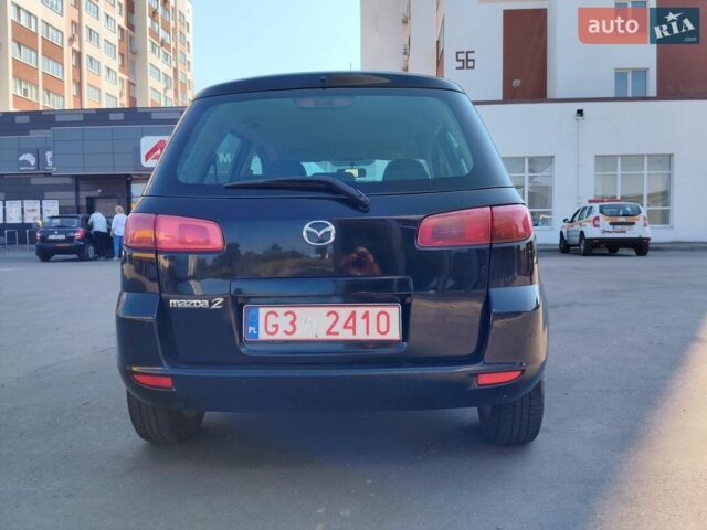 Чорний Мазда 2, об'ємом двигуна 1.4 л та пробігом 260 тис. км за 1700 $, фото 4 на Automoto.ua