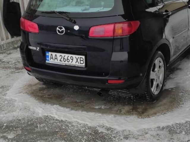Черный Мазда 2, объемом двигателя 1.4 л и пробегом 262 тыс. км за 4405 $, фото 3 на Automoto.ua