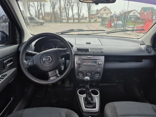 Черный Мазда 2, объемом двигателя 1.4 л и пробегом 240 тыс. км за 3500 $, фото 6 на Automoto.ua