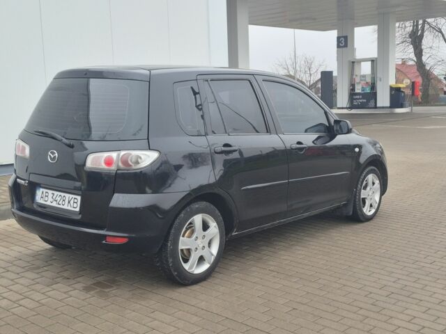 Черный Мазда 2, объемом двигателя 1.4 л и пробегом 240 тыс. км за 3500 $, фото 4 на Automoto.ua