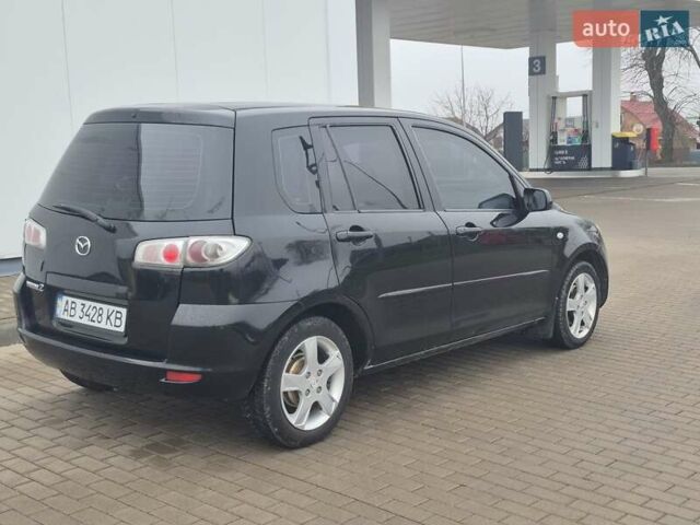 Черный Мазда 2, объемом двигателя 1.39 л и пробегом 240 тыс. км за 3500 $, фото 4 на Automoto.ua