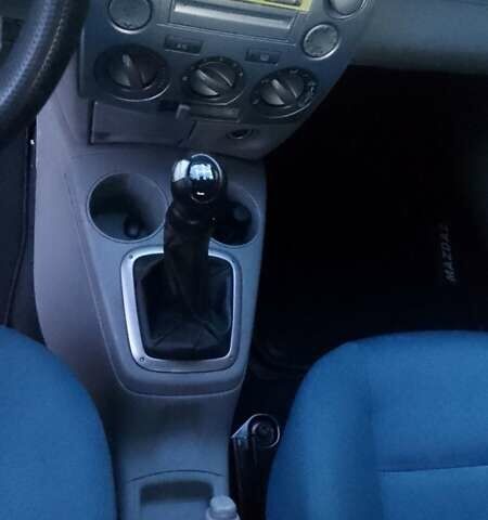 Черный Мазда 2, объемом двигателя 1.4 л и пробегом 237 тыс. км за 4300 $, фото 3 на Automoto.ua