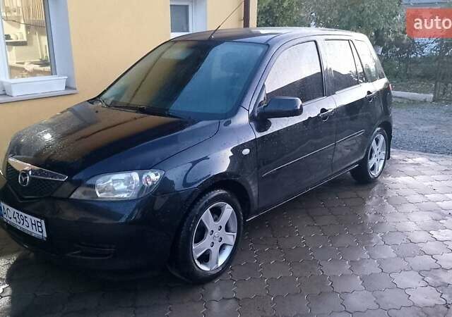 Черный Мазда 2, объемом двигателя 1.4 л и пробегом 237 тыс. км за 4300 $, фото 5 на Automoto.ua