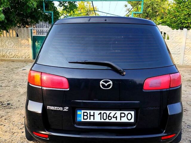 Черный Мазда 2, объемом двигателя 1.4 л и пробегом 0 тыс. км за 3800 $, фото 4 на Automoto.ua