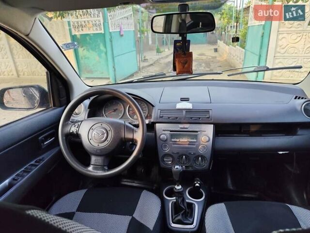 Чорний Мазда 2, об'ємом двигуна 1.4 л та пробігом 205 тис. км за 3700 $, фото 11 на Automoto.ua
