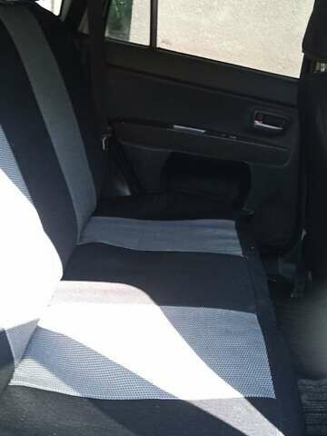 Чорний Мазда 2, об'ємом двигуна 1.4 л та пробігом 205 тис. км за 3700 $, фото 6 на Automoto.ua