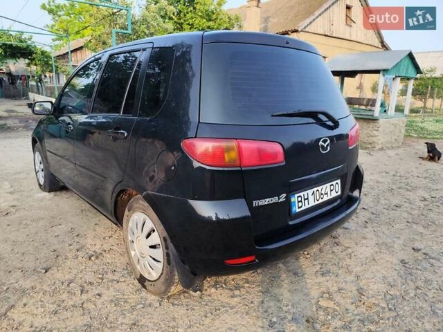 Чорний Мазда 2, об'ємом двигуна 1.4 л та пробігом 205 тис. км за 3700 $, фото 2 на Automoto.ua