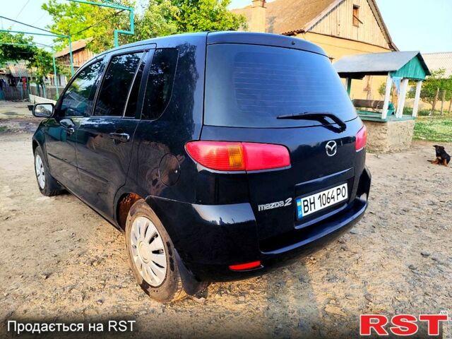 Черный Мазда 2, объемом двигателя 1.4 л и пробегом 0 тыс. км за 3800 $, фото 2 на Automoto.ua