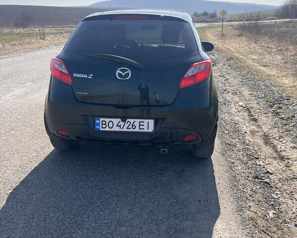 Черный Мазда 2, объемом двигателя 1.3 л и пробегом 250 тыс. км за 4200 $, фото 5 на Automoto.ua