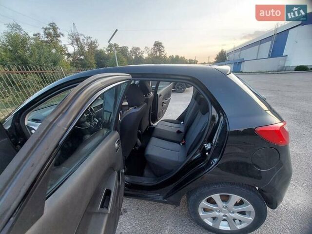 Черный Мазда 2, объемом двигателя 1.35 л и пробегом 187 тыс. км за 4800 $, фото 5 на Automoto.ua