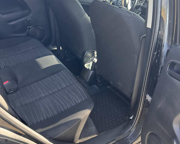 Черный Мазда 2, объемом двигателя 1.3 л и пробегом 250 тыс. км за 4200 $, фото 8 на Automoto.ua