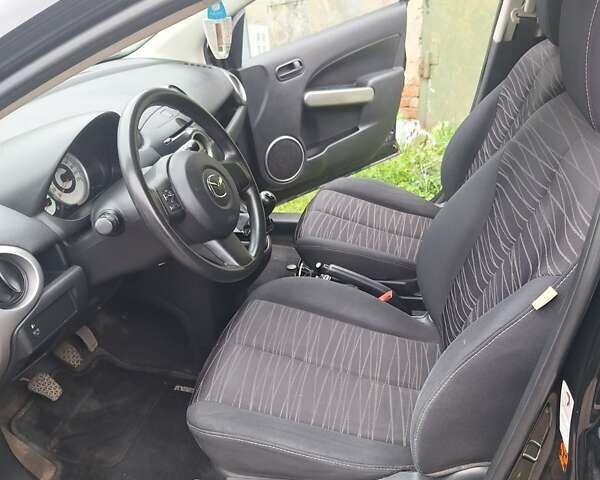Мазда 2 2007 в Староконстантинов на Automoto.ua Черный Мазда 2, объемом двигателя 1.35 л и пробегом 160 тыс. км за 4800 $, фото 2 на Automoto.ua