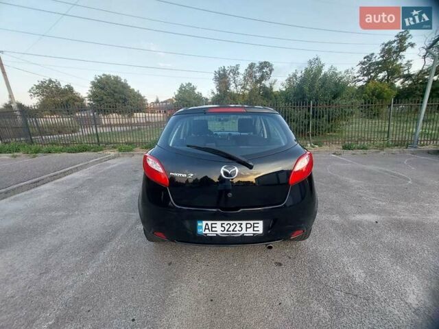 Черный Мазда 2, объемом двигателя 1.35 л и пробегом 187 тыс. км за 4800 $, фото 3 на Automoto.ua