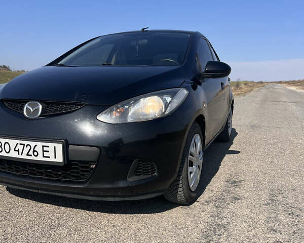 Черный Мазда 2, объемом двигателя 1.3 л и пробегом 250 тыс. км за 4200 $, фото 2 на Automoto.ua