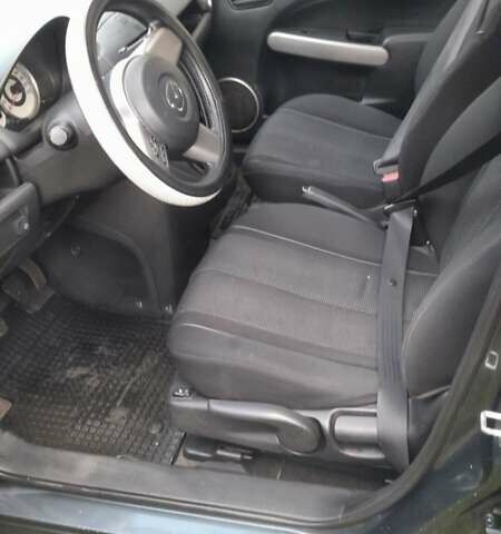 Черный Мазда 2, объемом двигателя 1.5 л и пробегом 226 тыс. км за 5500 $, фото 1 на Automoto.ua