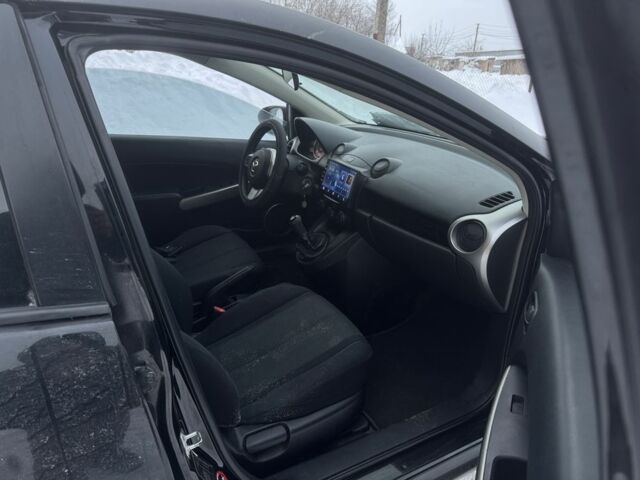 Чорний Мазда 2, об'ємом двигуна 1.4 л та пробігом 237 тис. км за 1777 $, фото 6 на Automoto.ua