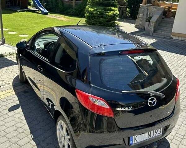 Чорний Мазда 2, об'ємом двигуна 1.5 л та пробігом 196 тис. км за 5977 $, фото 1 на Automoto.ua
